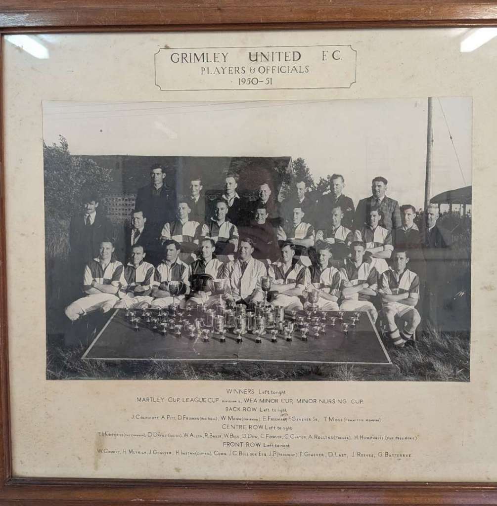 Football players standing proud Grimley United FC 1950